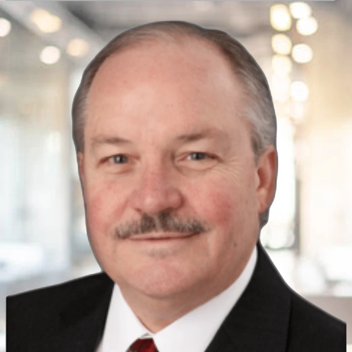 Art Jetter Jr. in a dark suit and red tie
